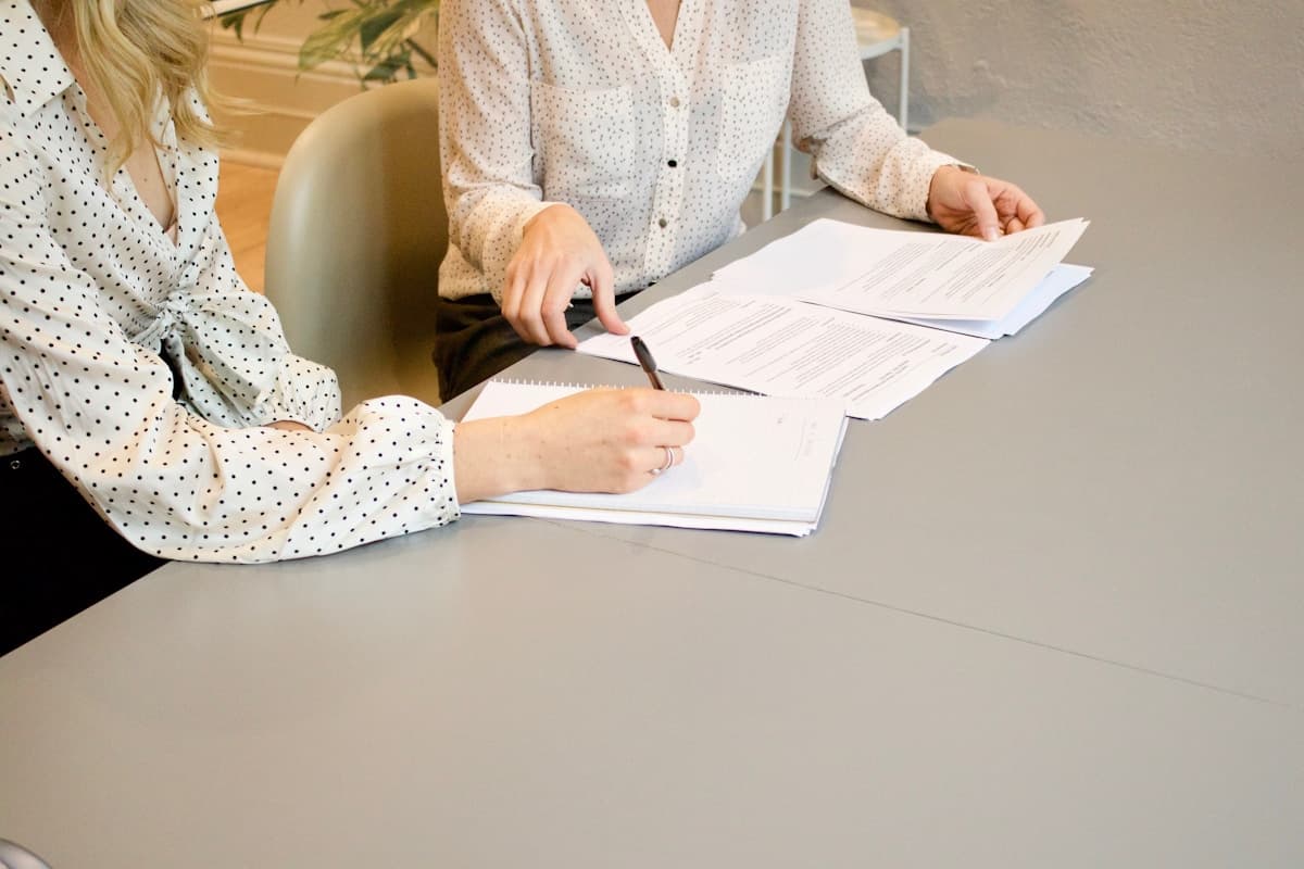 Expert helping a client with documents in Slovakia